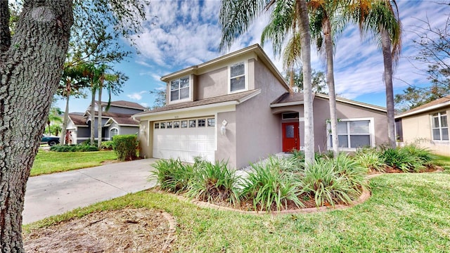 front of property with a garage and a front lawn