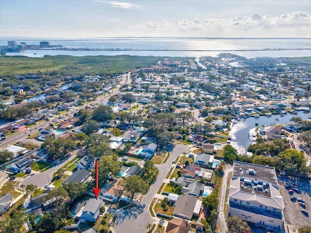 bird's eye view with a water view