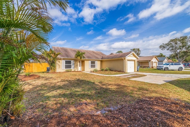 ranch-style house with a garage and a front lawn