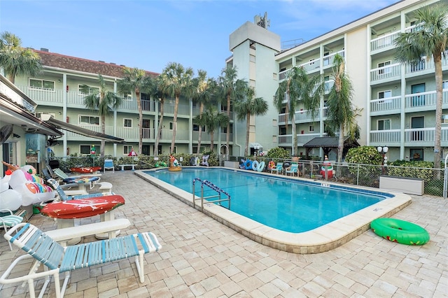 view of pool featuring a patio