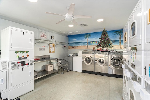 laundry room featuring stacked washer and dryer, washer and dryer, and ceiling fan