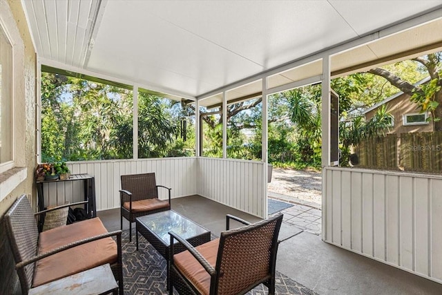 sunroom featuring a wealth of natural light