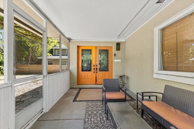 sunroom / solarium with french doors