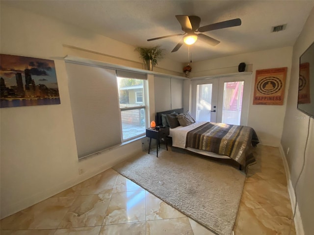 bedroom featuring ceiling fan, access to outside, and french doors