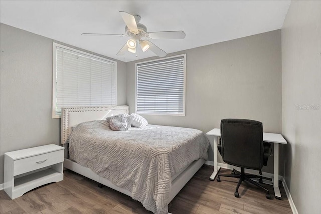 bedroom featuring wood-type flooring and ceiling fan