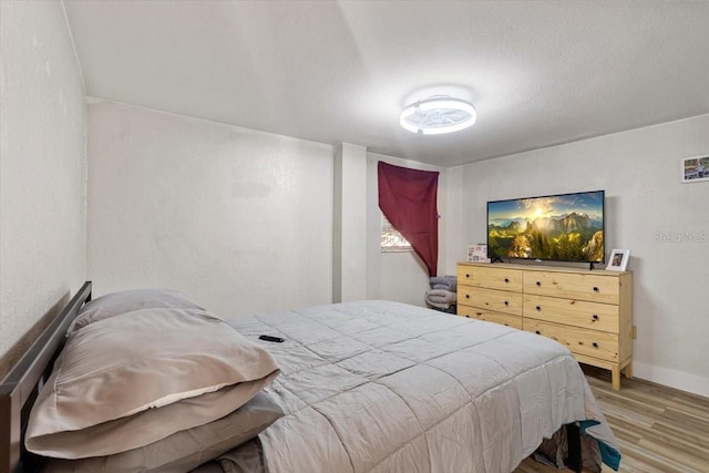 bedroom featuring light hardwood / wood-style flooring