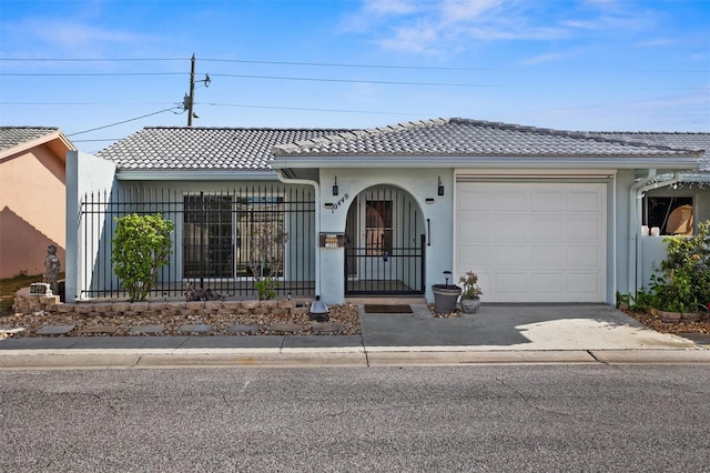 view of front of property featuring a garage