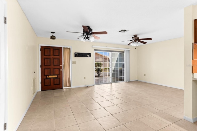 interior space featuring ceiling fan