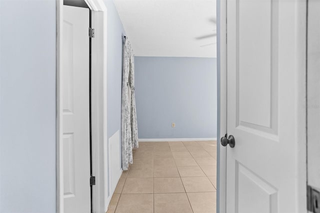 hallway with light tile patterned flooring