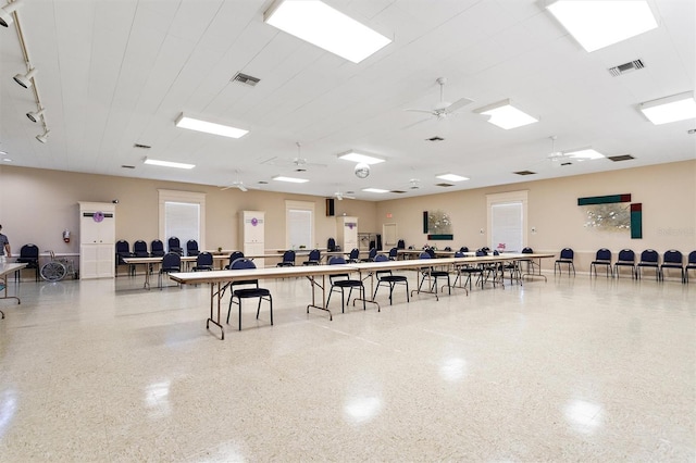 interior space featuring ceiling fan