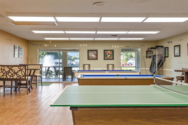 playroom featuring hardwood / wood-style flooring and pool table