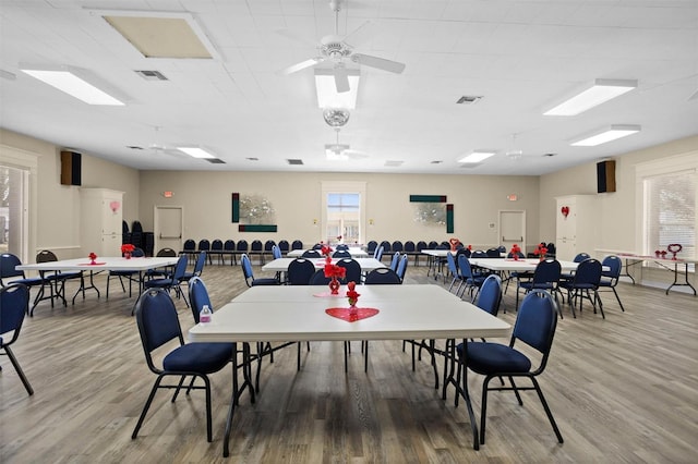 10449 Larchmont Pl N, Pinellas Park, FL 33782 - dining room with visible vents and light wood-type flooring