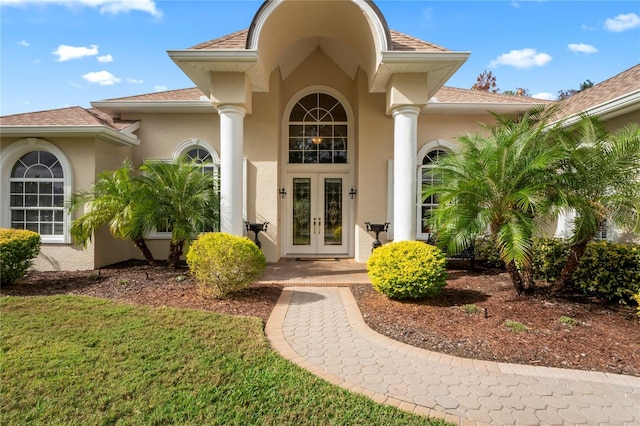 doorway to property with french doors