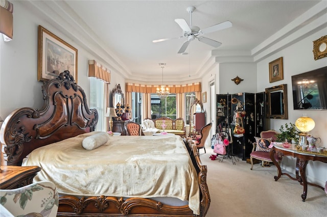 carpeted bedroom with ceiling fan with notable chandelier and ornamental molding