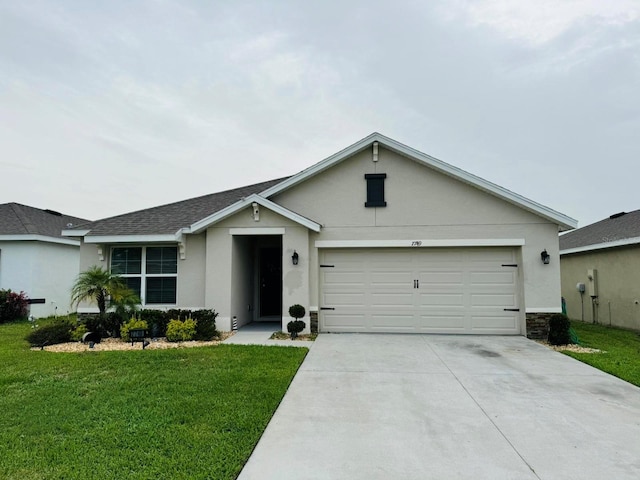 single story home featuring a front yard and a garage