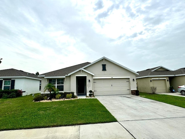 single story home with a garage and a front lawn