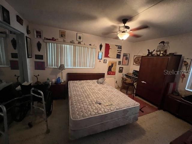 bedroom featuring ceiling fan