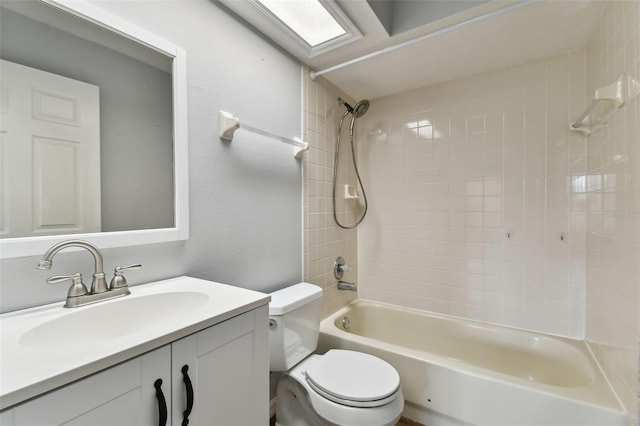 full bathroom featuring vanity, toilet, and tiled shower / bath