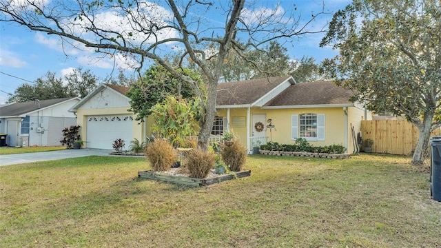 ranch-style house featuring a garage and a front lawn