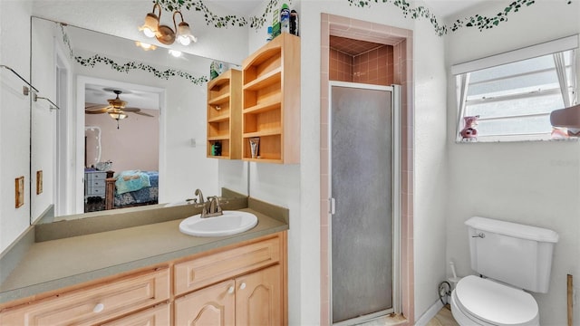 bathroom featuring ceiling fan, walk in shower, vanity, and toilet