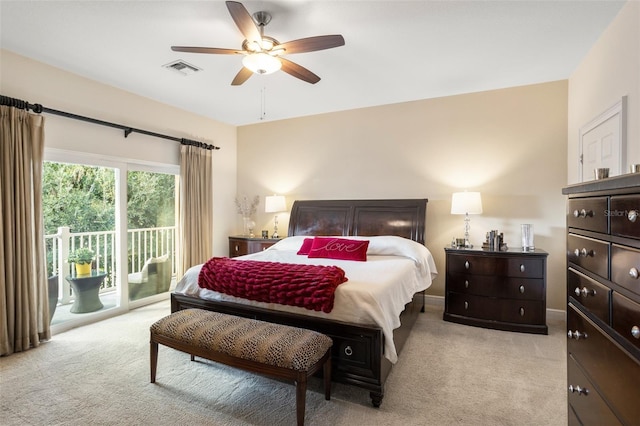 carpeted bedroom featuring access to exterior and ceiling fan