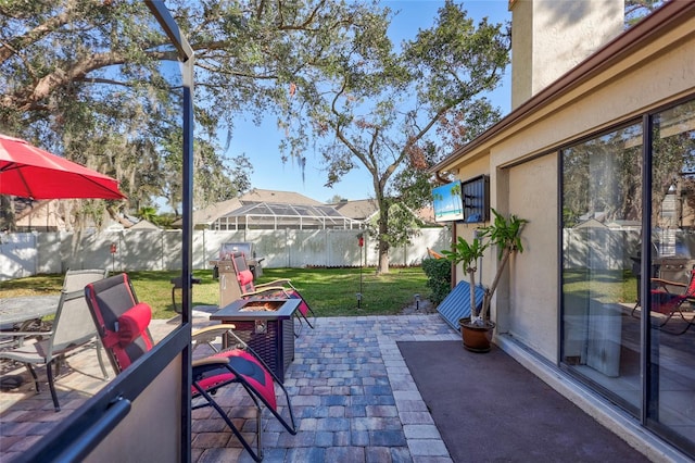 view of patio with an outdoor fire pit