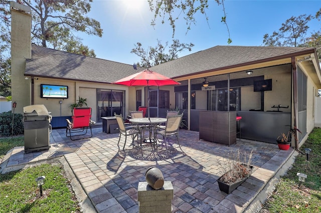 rear view of house with a patio area