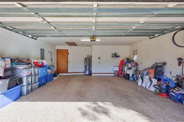 garage with electric panel, water heater, and a garage door opener