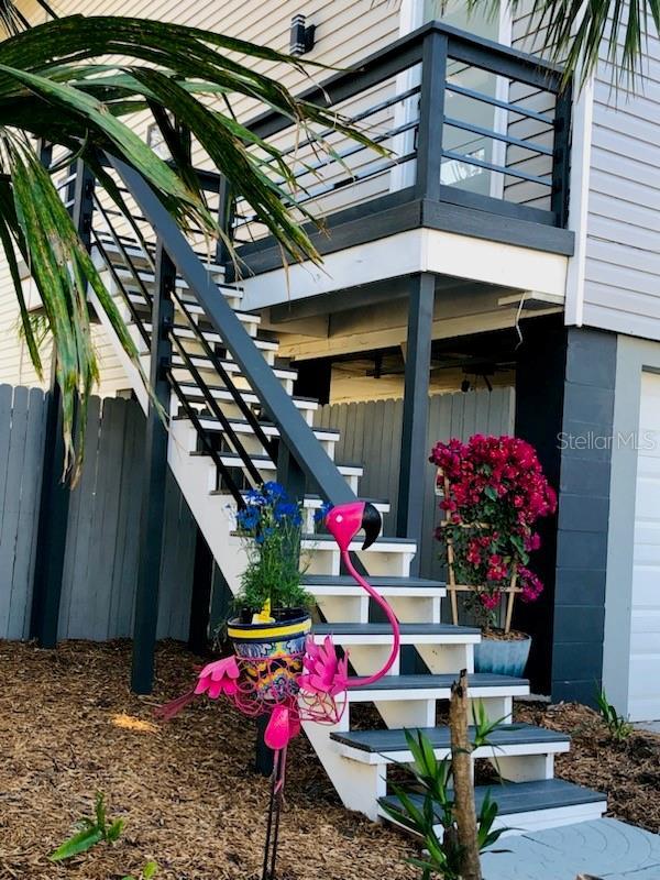 entrance to property with a balcony