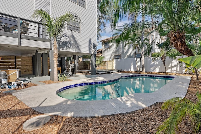 view of swimming pool featuring a patio area