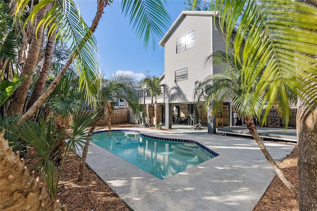 view of swimming pool featuring a patio area