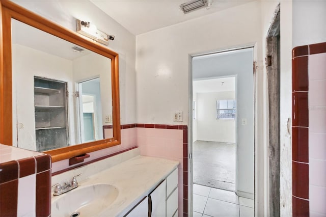 bathroom featuring vanity and tile patterned floors