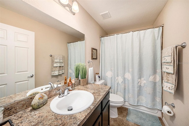 full bathroom with vanity, tile patterned flooring, toilet, shower / bathtub combination with curtain, and a textured ceiling