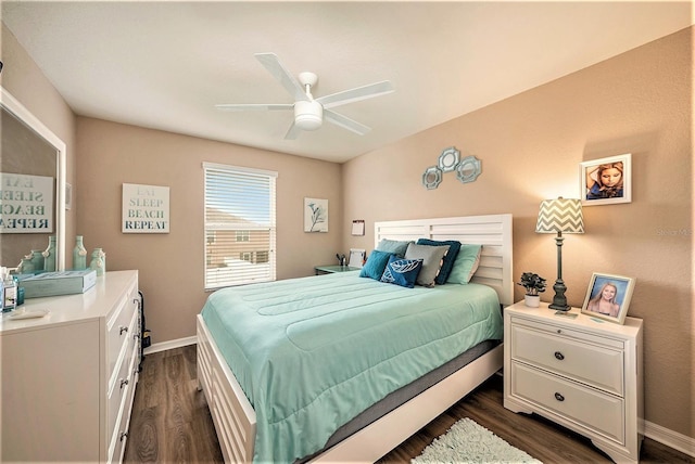 bedroom featuring ceiling fan and dark wood-type flooring