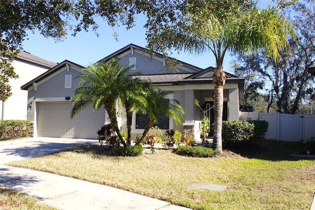 view of front facade with a front lawn and a garage