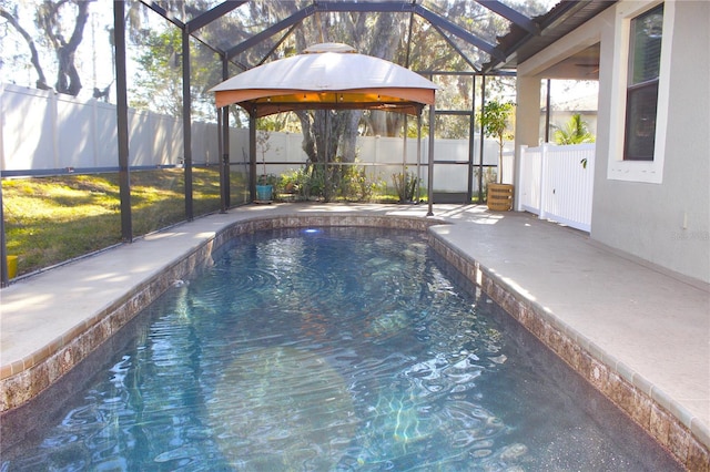 view of swimming pool featuring a gazebo