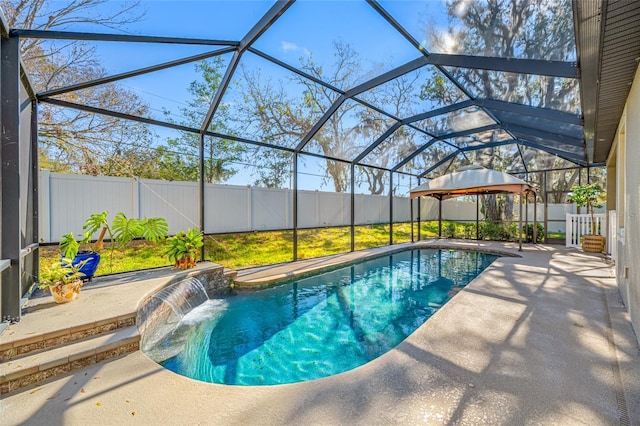 view of pool featuring a lanai, a patio area, a fenced backyard, and a fenced in pool