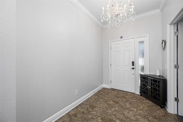 foyer entrance featuring baseboards, a chandelier, and crown molding