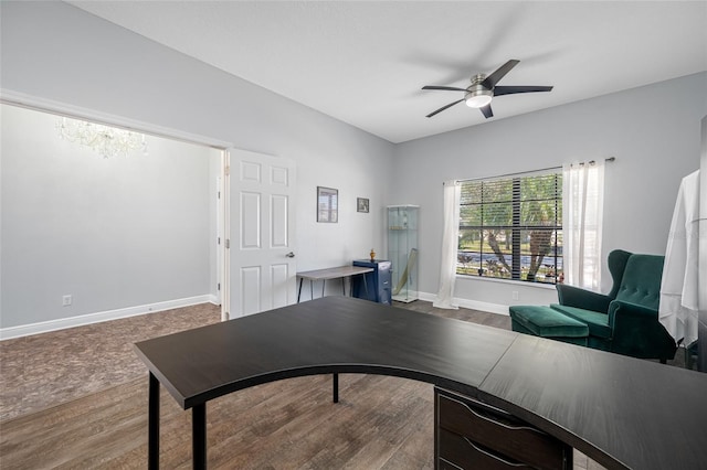 office space with ceiling fan, baseboards, and wood finished floors