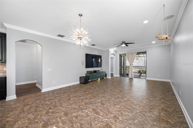 unfurnished living room featuring baseboards, arched walkways, and crown molding