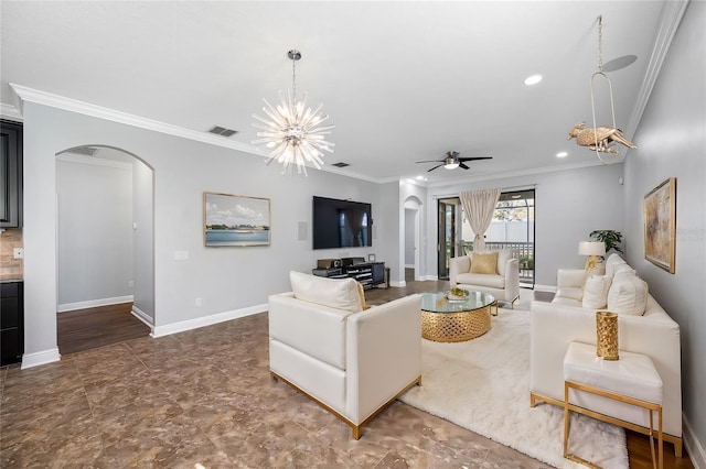 living room featuring ornamental molding, arched walkways, and baseboards