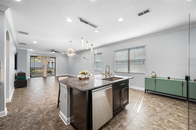 kitchen featuring ornamental molding, visible vents, a sink, and stainless steel dishwasher