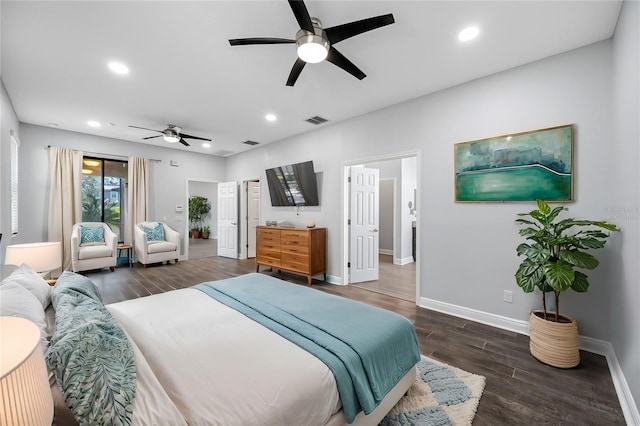 bedroom featuring baseboards, dark wood finished floors, visible vents, and recessed lighting