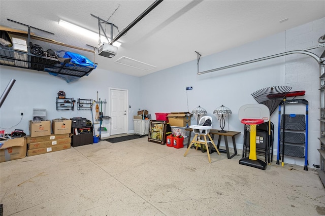 garage featuring a garage door opener