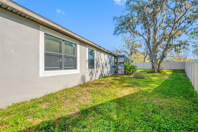 view of yard featuring a fenced backyard