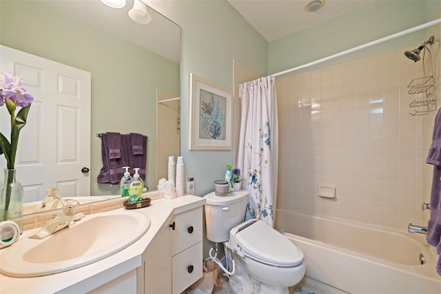 full bathroom featuring vanity, toilet, and shower / tub combo with curtain