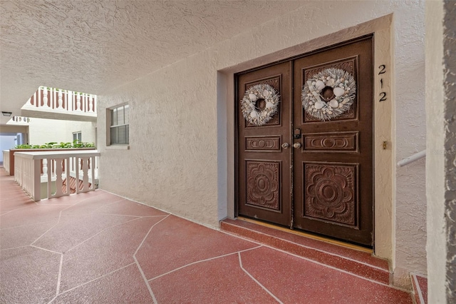 entrance to property with covered porch