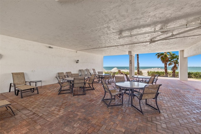 view of patio / terrace featuring a water view