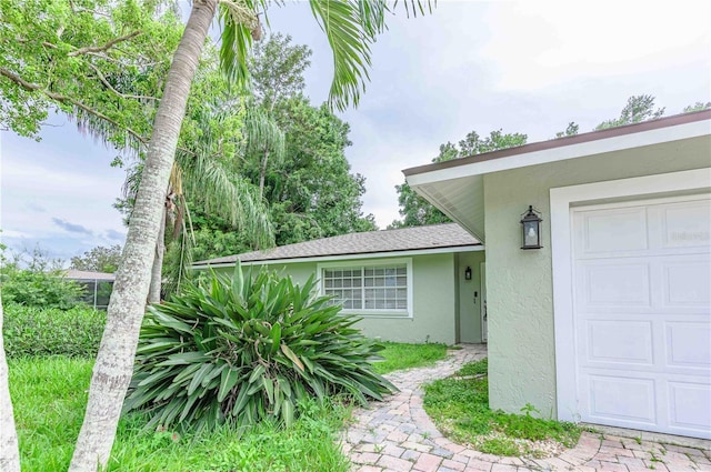 entrance to property with a garage