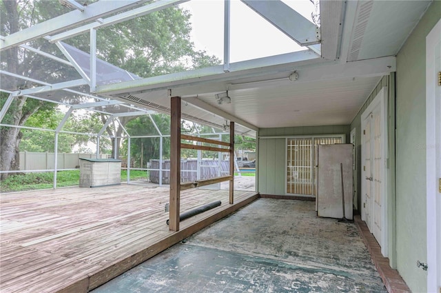 unfurnished sunroom with a healthy amount of sunlight